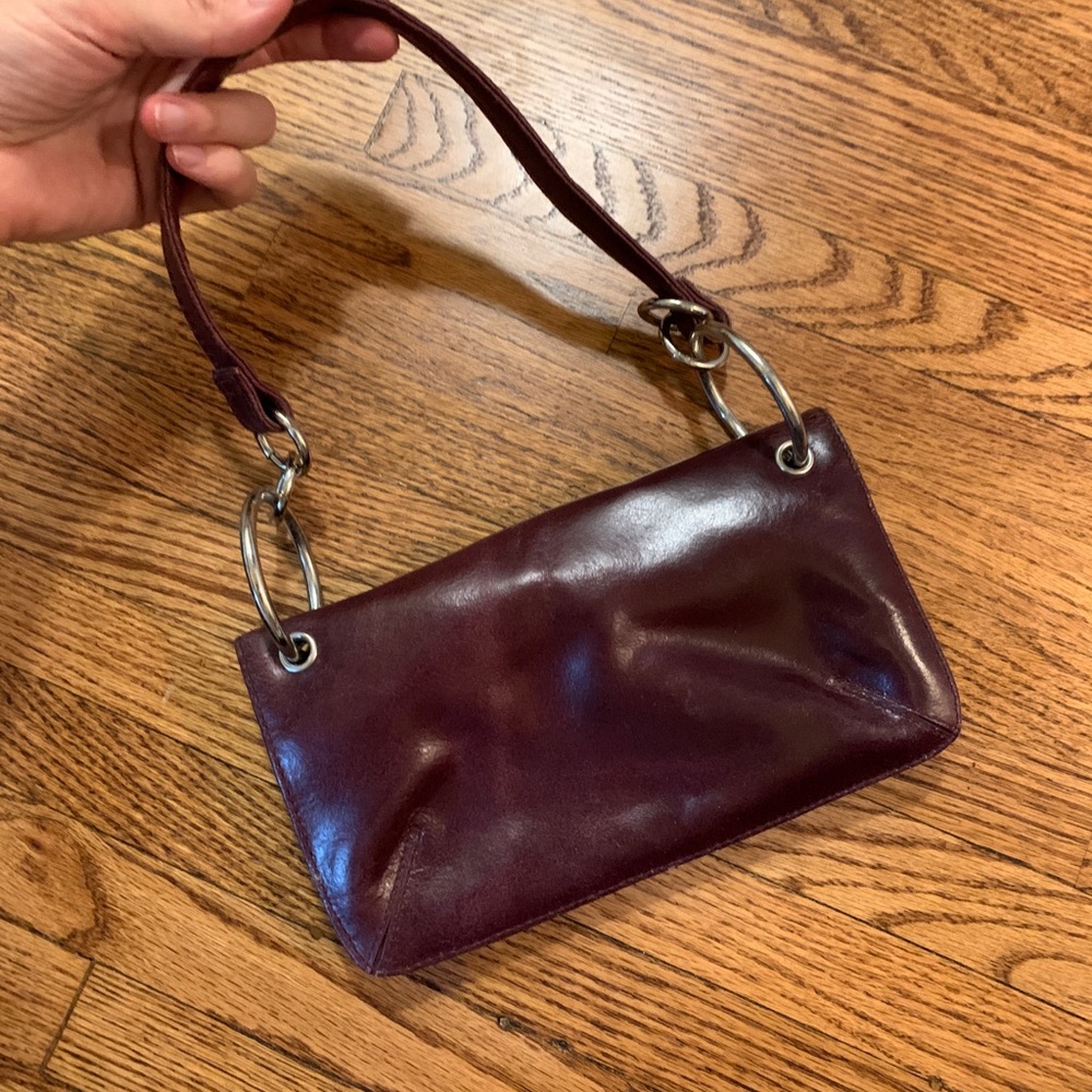 Wilson’s Leather plum/burgundy wristlet